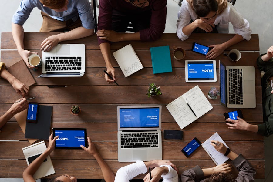 Enterprise team meeting in a boardroom-style office